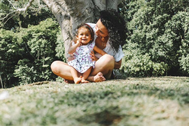 woman looking at toddler