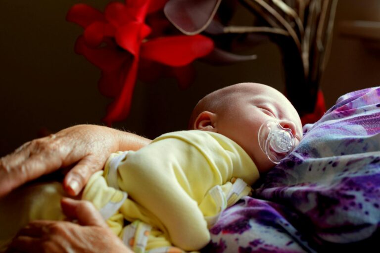 toddler sleeping while sucking pacifier